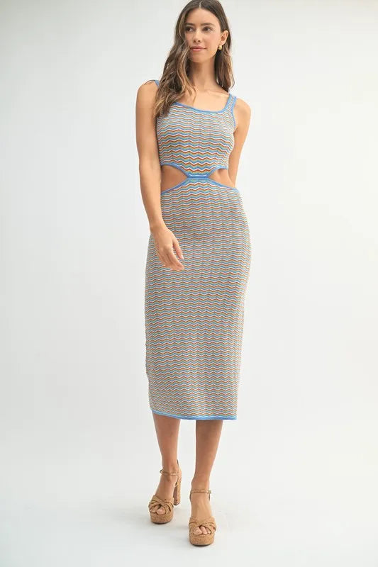 Women's bodycon midi dress is adorned with a multi-color chevron knit pattern for a vibrant and eye-catching look. The fitted silhouette accentuates your curves while the chevron design adds a trendy element.