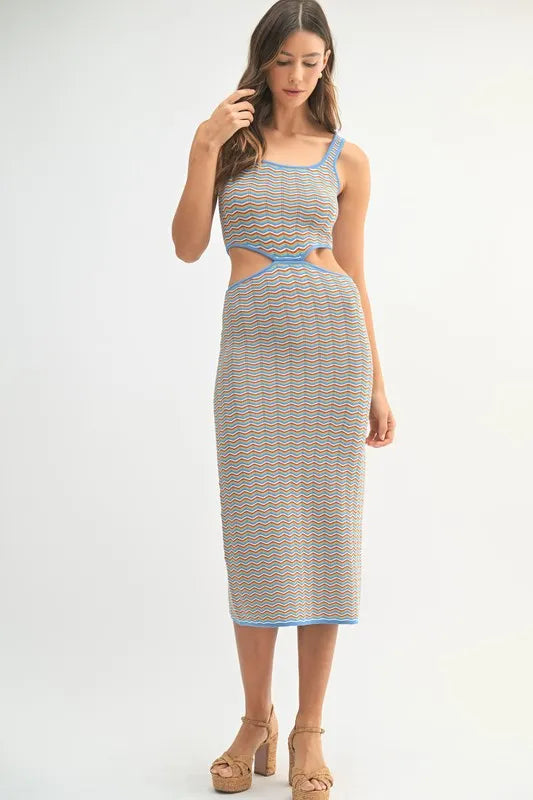 Women's bodycon midi dress is adorned with a multi-color chevron knit pattern for a vibrant and eye-catching look. The fitted silhouette accentuates your curves while the chevron design adds a trendy element.