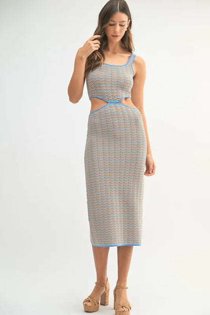 Women's bodycon midi dress is adorned with a multi-color chevron knit pattern for a vibrant and eye-catching look. The fitted silhouette accentuates your curves while the chevron design adds a trendy element.