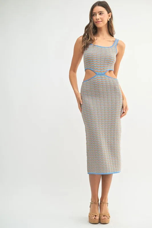 Women's bodycon midi dress is adorned with a multi-color chevron knit pattern for a vibrant and eye-catching look. The fitted silhouette accentuates your curves while the chevron design adds a trendy element.