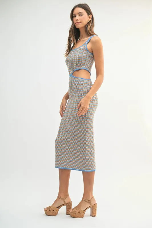 Women's bodycon midi dress is adorned with a multi-color chevron knit pattern for a vibrant and eye-catching look. The fitted silhouette accentuates your curves while the chevron design adds a trendy element.