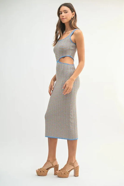 Women's bodycon midi dress is adorned with a multi-color chevron knit pattern for a vibrant and eye-catching look. The fitted silhouette accentuates your curves while the chevron design adds a trendy element.