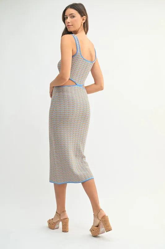 Women's bodycon midi dress is adorned with a multi-color chevron knit pattern for a vibrant and eye-catching look. The fitted silhouette accentuates your curves while the chevron design adds a trendy element.