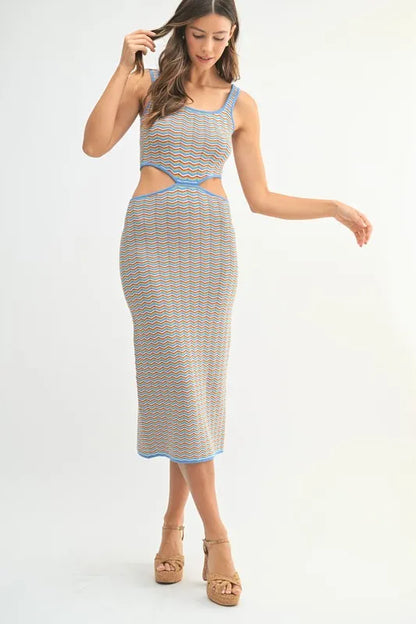 Women's bodycon midi dress is adorned with a multi-color chevron knit pattern for a vibrant and eye-catching look. The fitted silhouette accentuates your curves while the chevron design adds a trendy element.